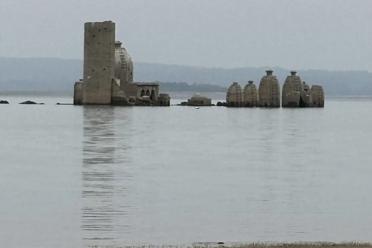 The Bathu ki Ladi temples standing in the water of the Pong Dam reservoir, Kangra
